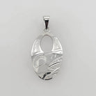 Silver Wolf Pendant by Cree artist Justin Rivard