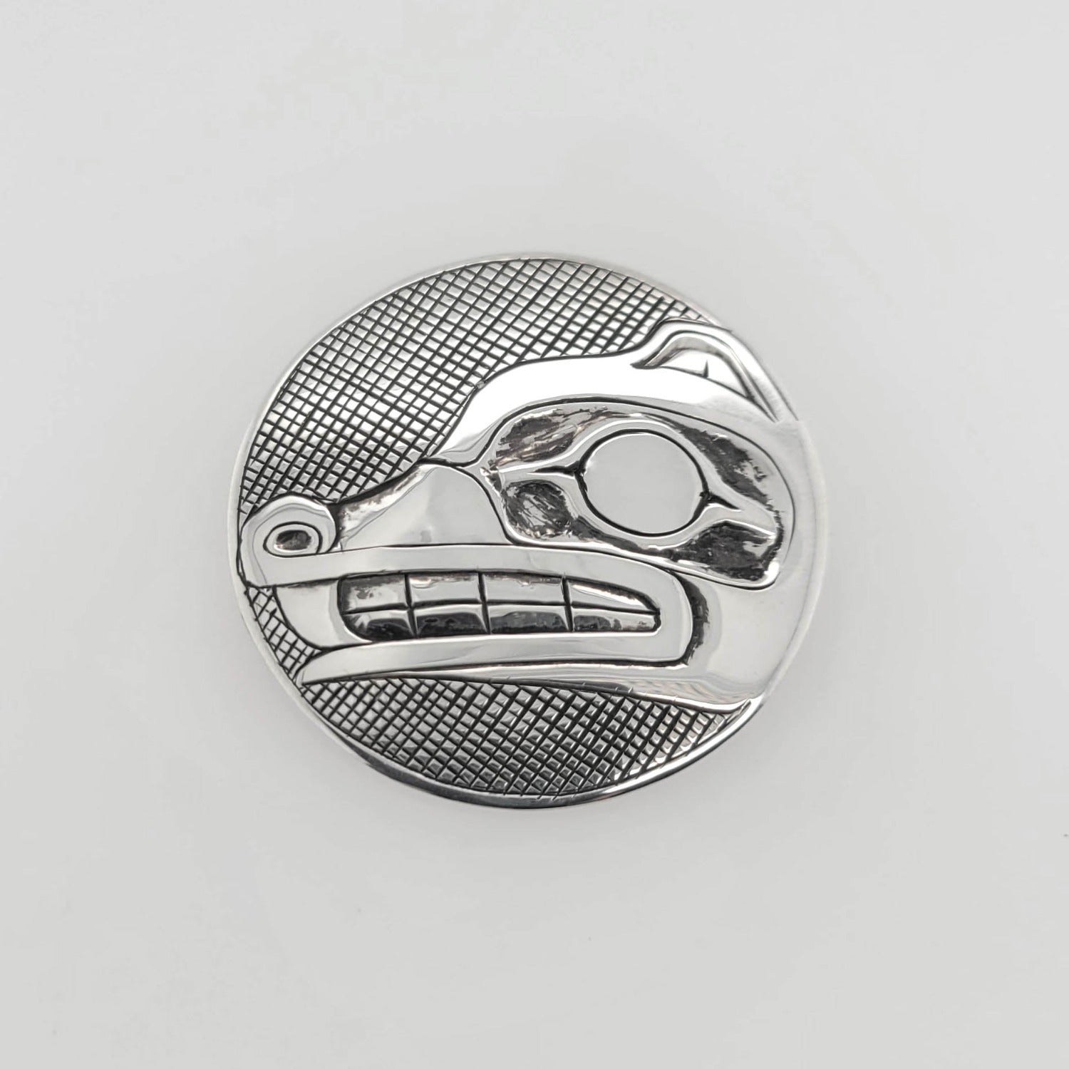 Silver Wolf Pendant by Haida artist Carmen Goertzen