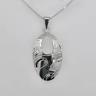 Silver Wolf Pendant by Cree artist Justin Rivard