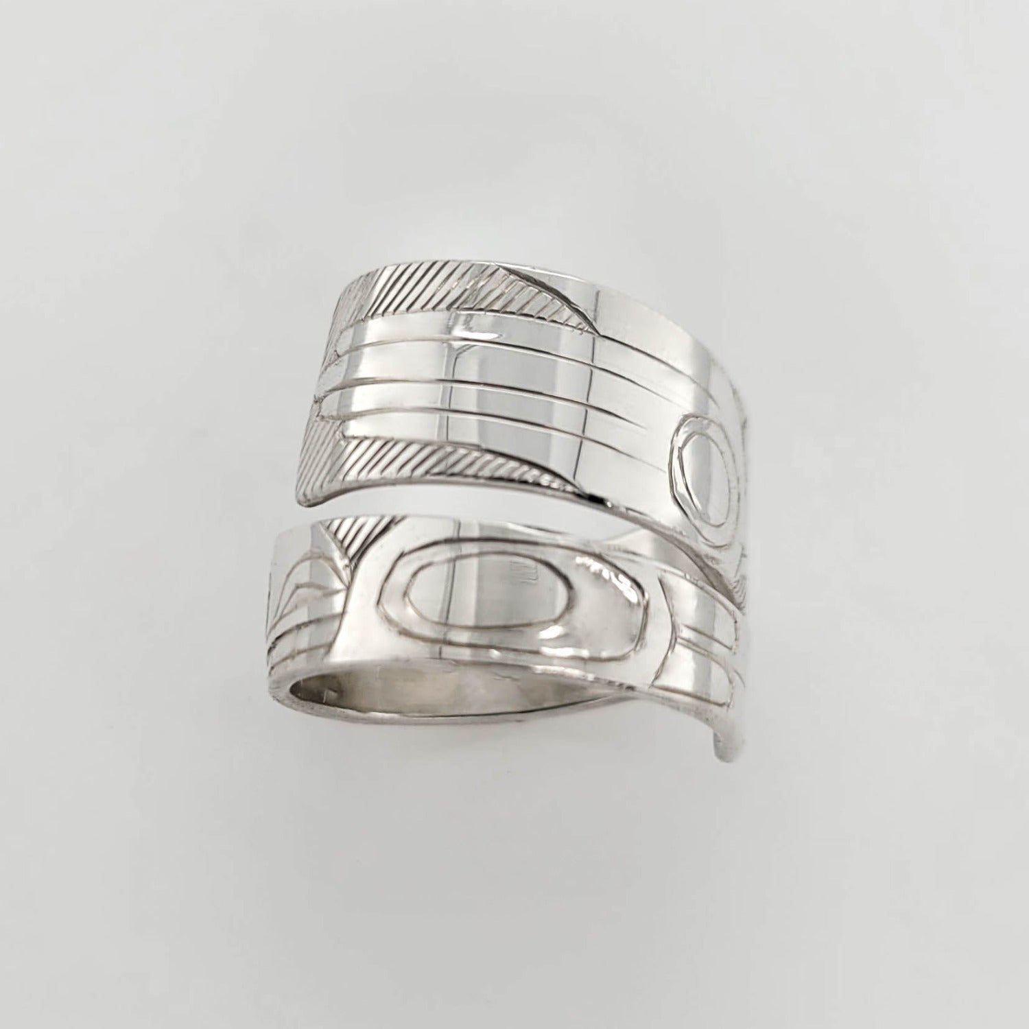 Silver Raven Transformation Wrap Ring by Haida artist Andrew Williams