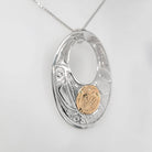 Silver and Gold Raven Steals the Light Pendant by Bill Helin