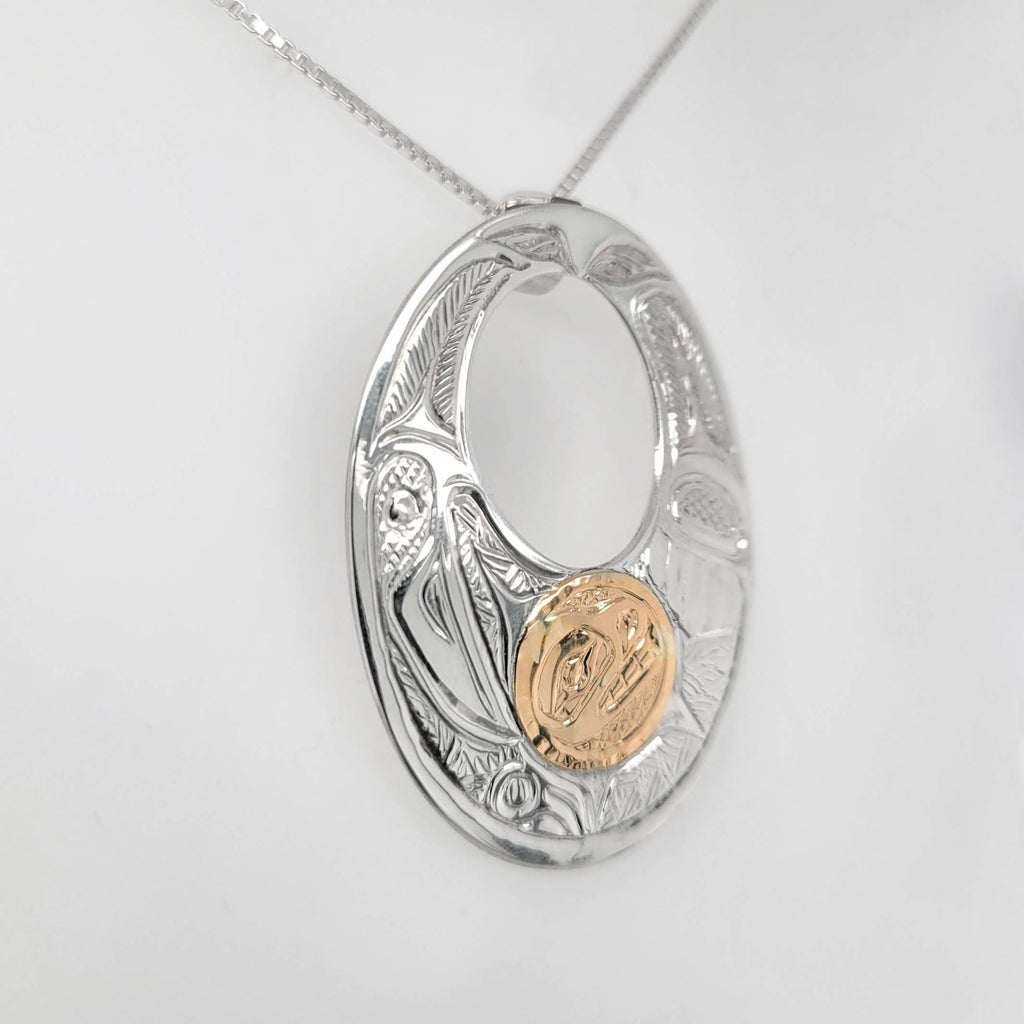 Silver and Gold Raven Steals the Light Pendant by Bill Helin