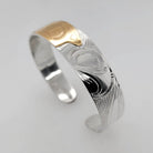 Silver and Gold Wolf Bracelet by Cree artist Justin Rivard