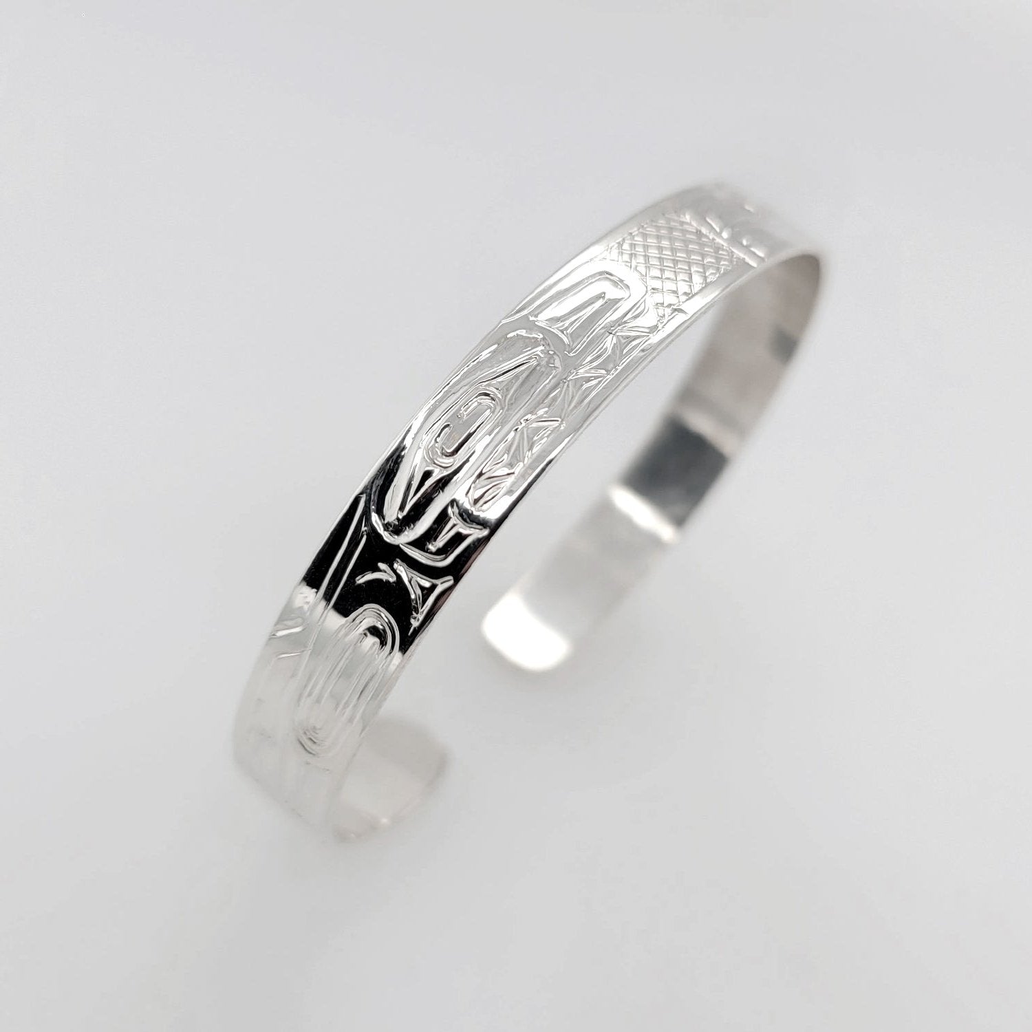 Silver Eagle and Orca Bracelet by Haida artist Garner Moody