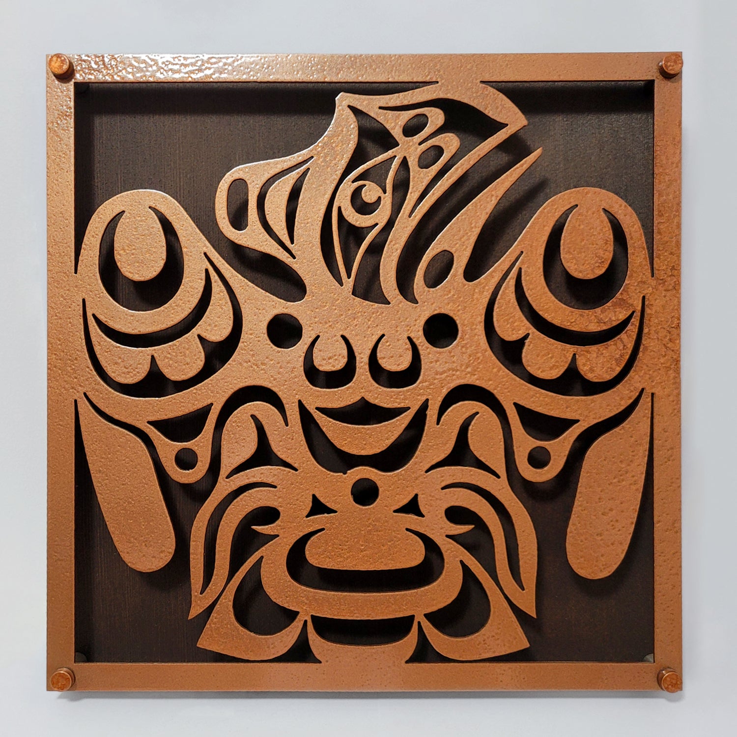 Metal Raven Panel by Kwakiutl artist Trevor Hunt