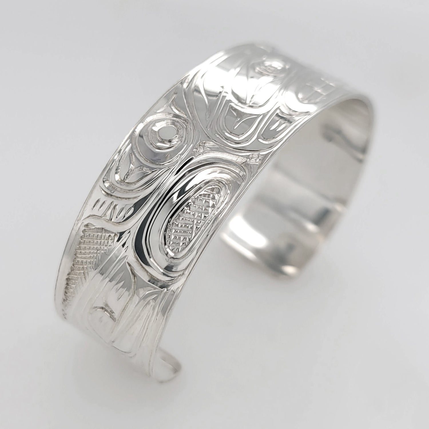 Silver Thunderbird & Kulus Bracelet by Don Wadhams, Kwakwaka'wakw