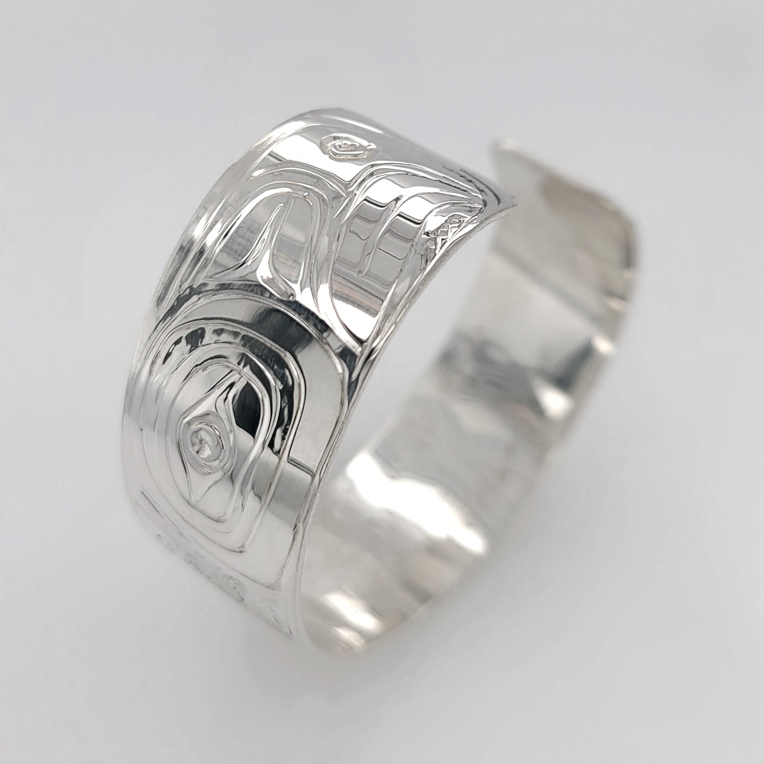 Silver Thunderbird & Kulus Bracelet by Don Wadhams, Kwakwaka'wakw