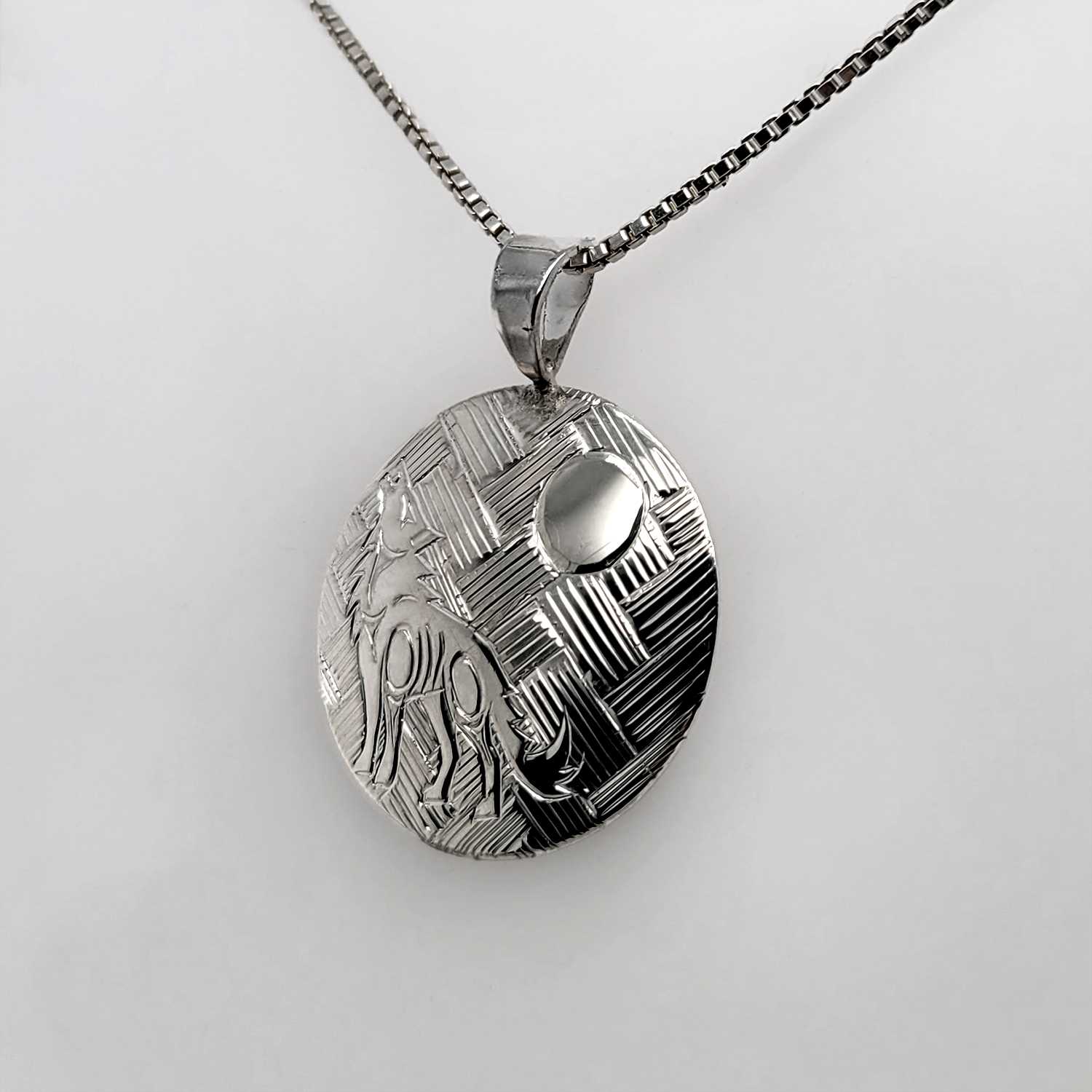 Silver Wolf and Moon Pendant by Jody Sparrow, Coast Salish
