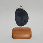 Woman in the Moon argillite pendant by Haida artist Darrell White