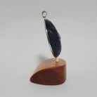 Woman in the Moon argillite pendant by Haida artist Darrell White