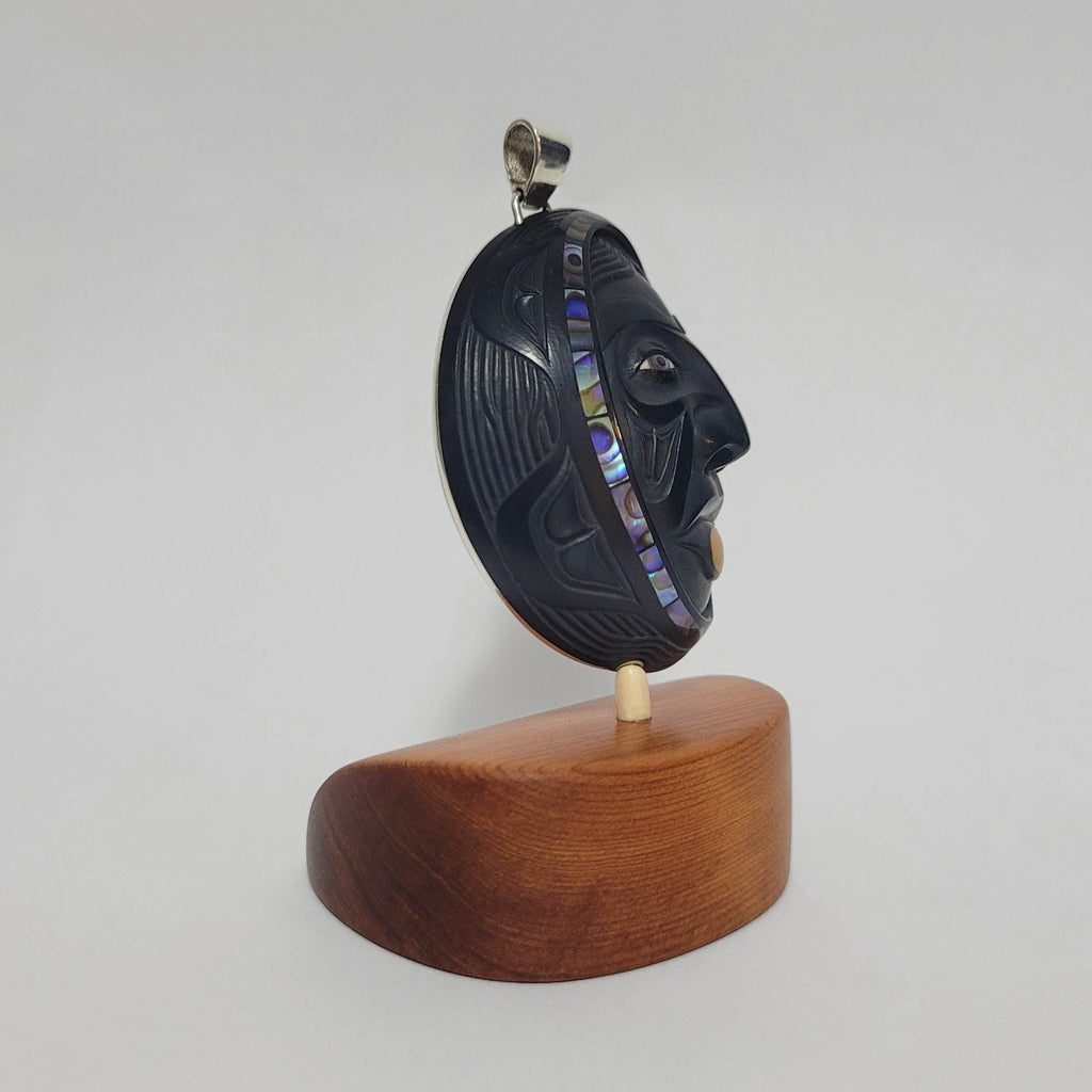 Woman in the Moon argillite pendant by Haida artist Darrell White