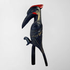 First Nations Woodpecker Rattle and stand by Kwakwaka'wakw carver Greg Henderson