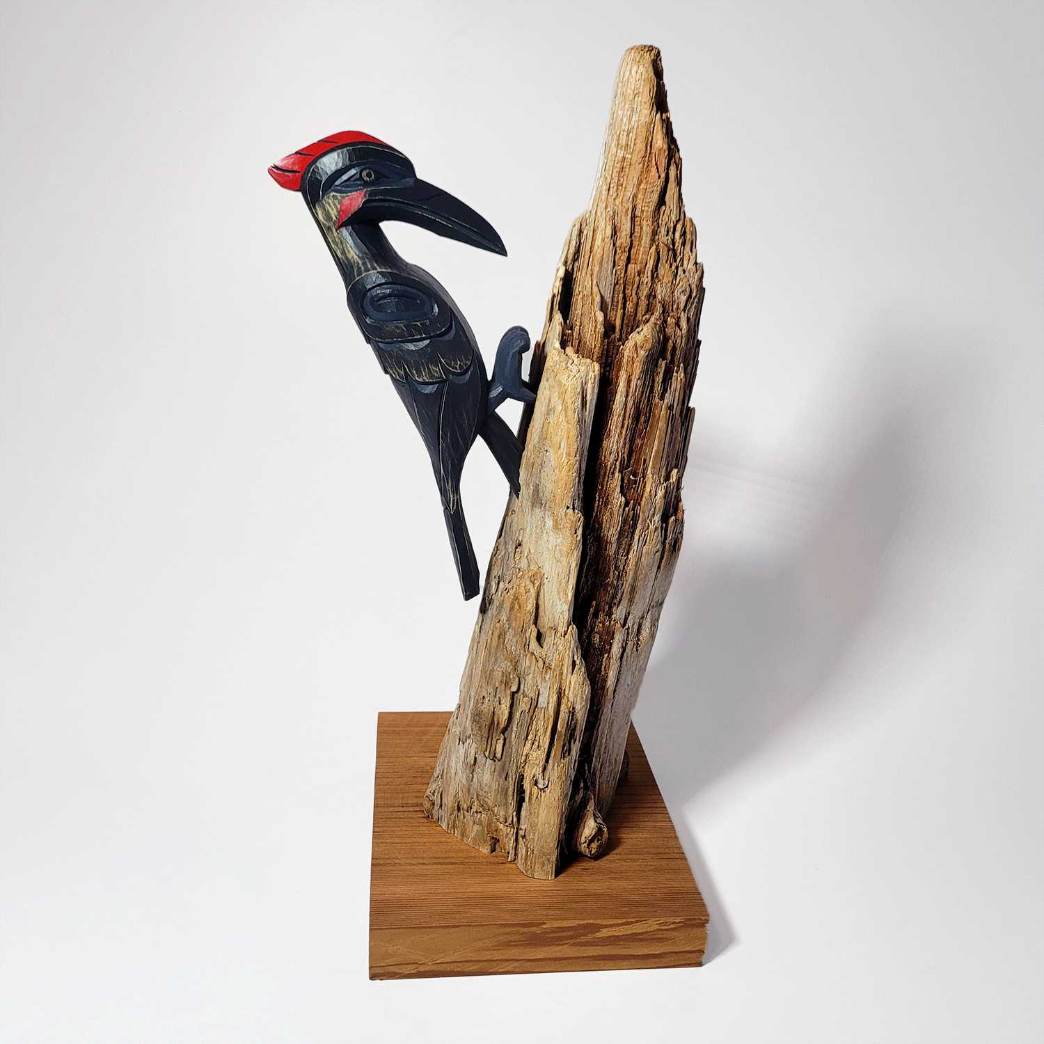 First Nations Woodpecker Rattle and stand by Kwakwaka'wakw carver Greg Henderson