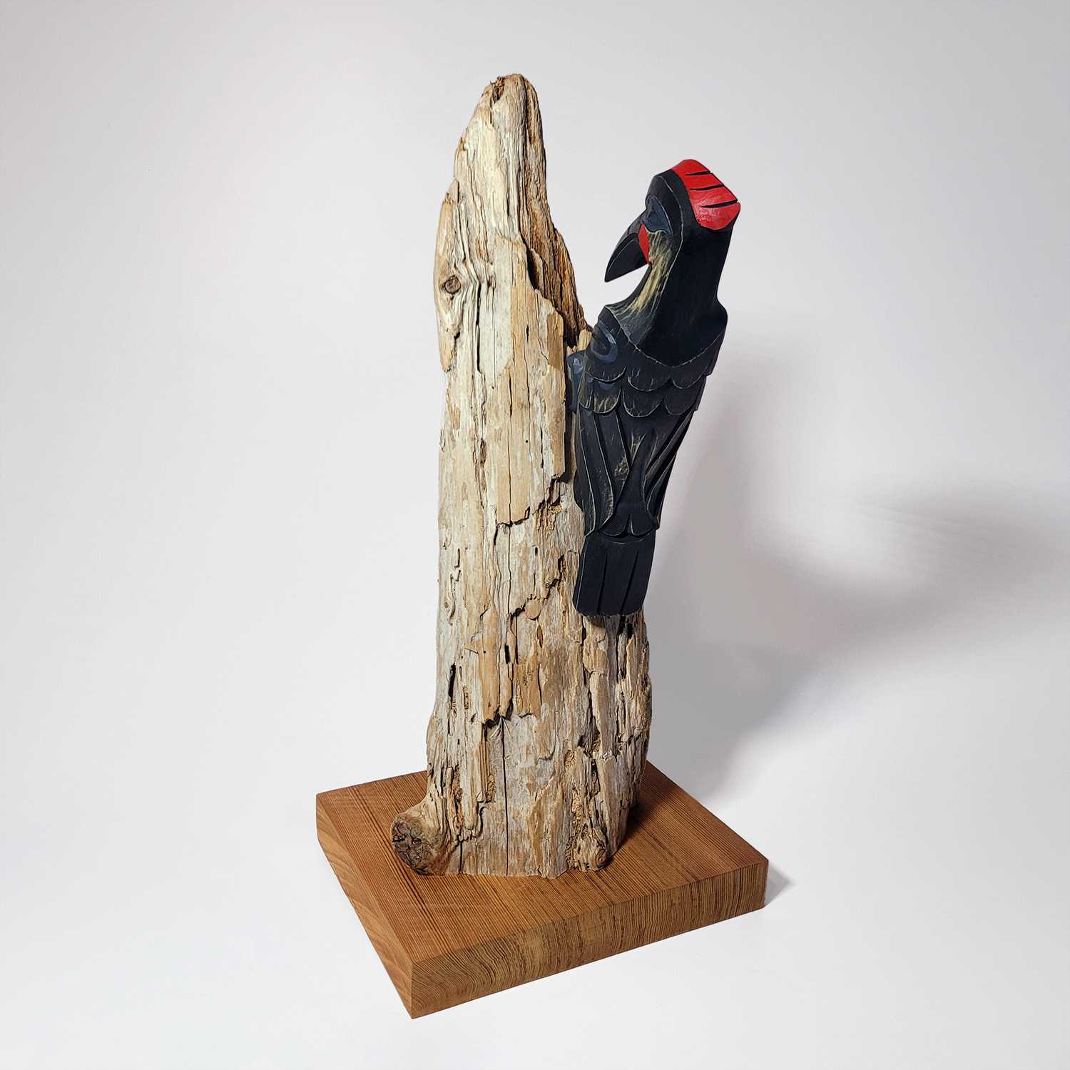 First Nations Woodpecker Rattle and stand by Kwakwaka'wakw carver Greg Henderson