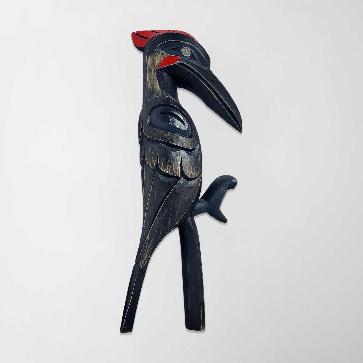 First Nations Woodpecker Rattle and stand by Kwakwaka'wakw carver Greg Henderson