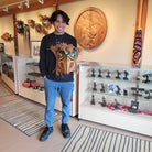 Kwakwaka'wakw carver Talon George holding Eagle Mask