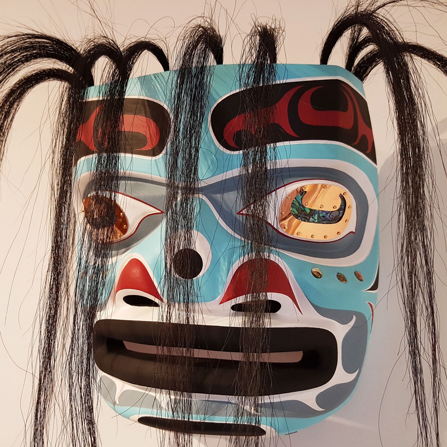 Cedar and Abalone Harvet Portrait Mask by Kwakiutl carver Trevor Hunt