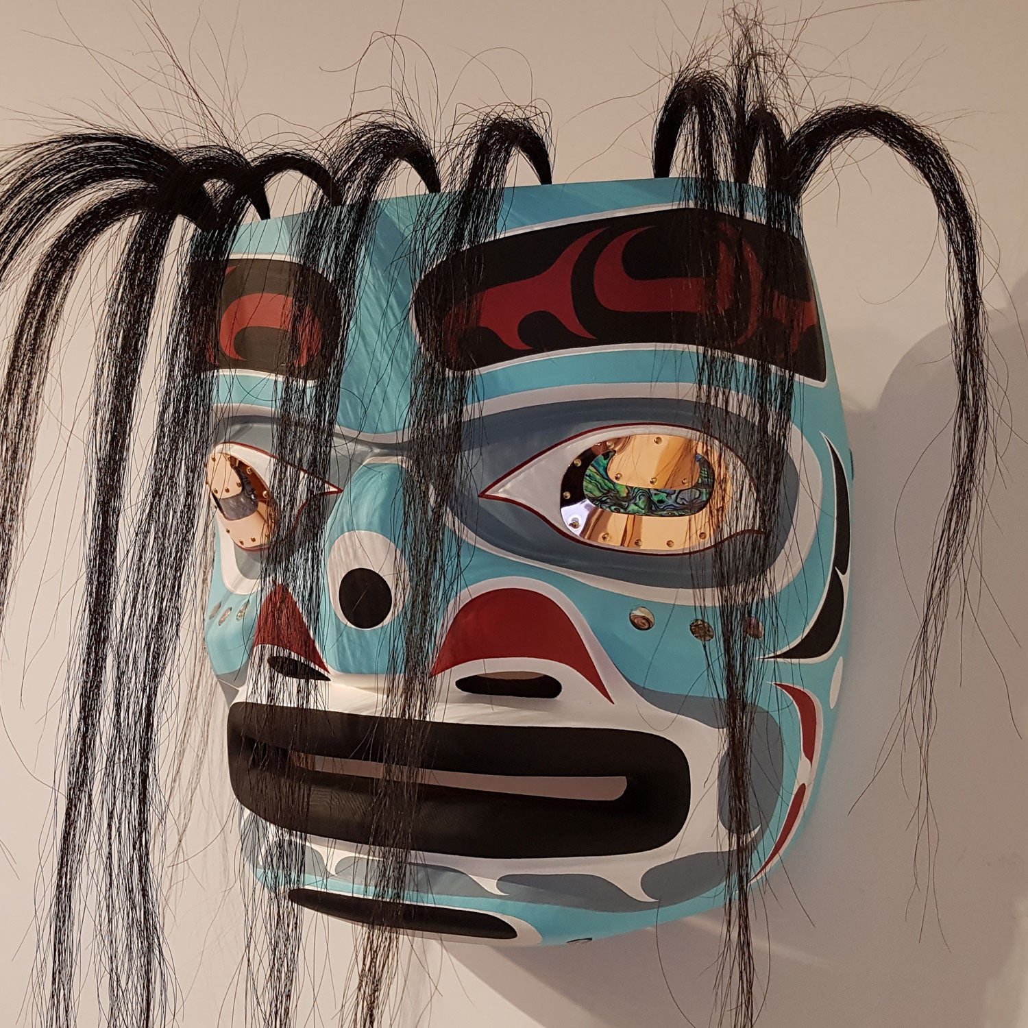 Cedar and Abalone Harvet Portrait Mask by Kwakiutl carver Trevor Hunt