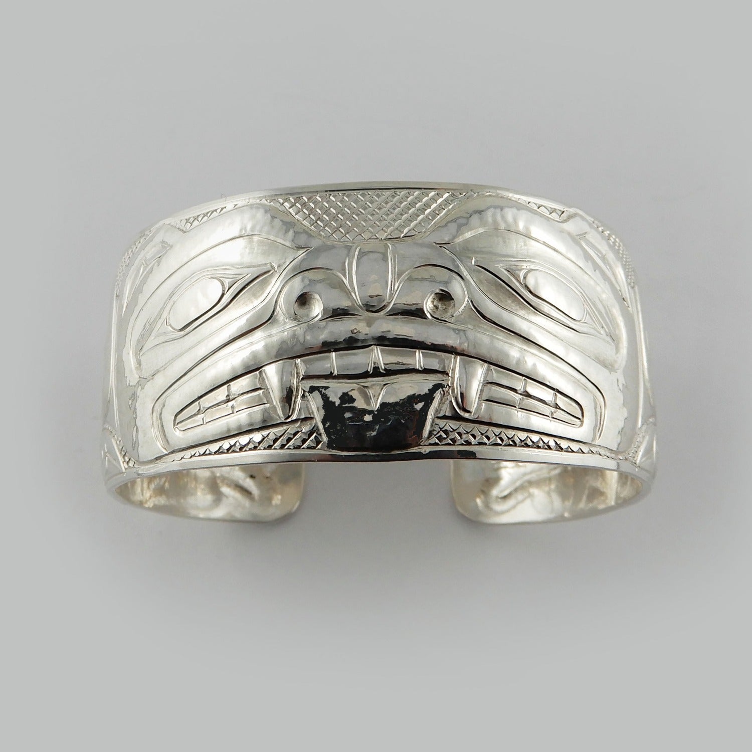 Silver Carved and Hammered Bear Bracelet by Haida artist Derek White