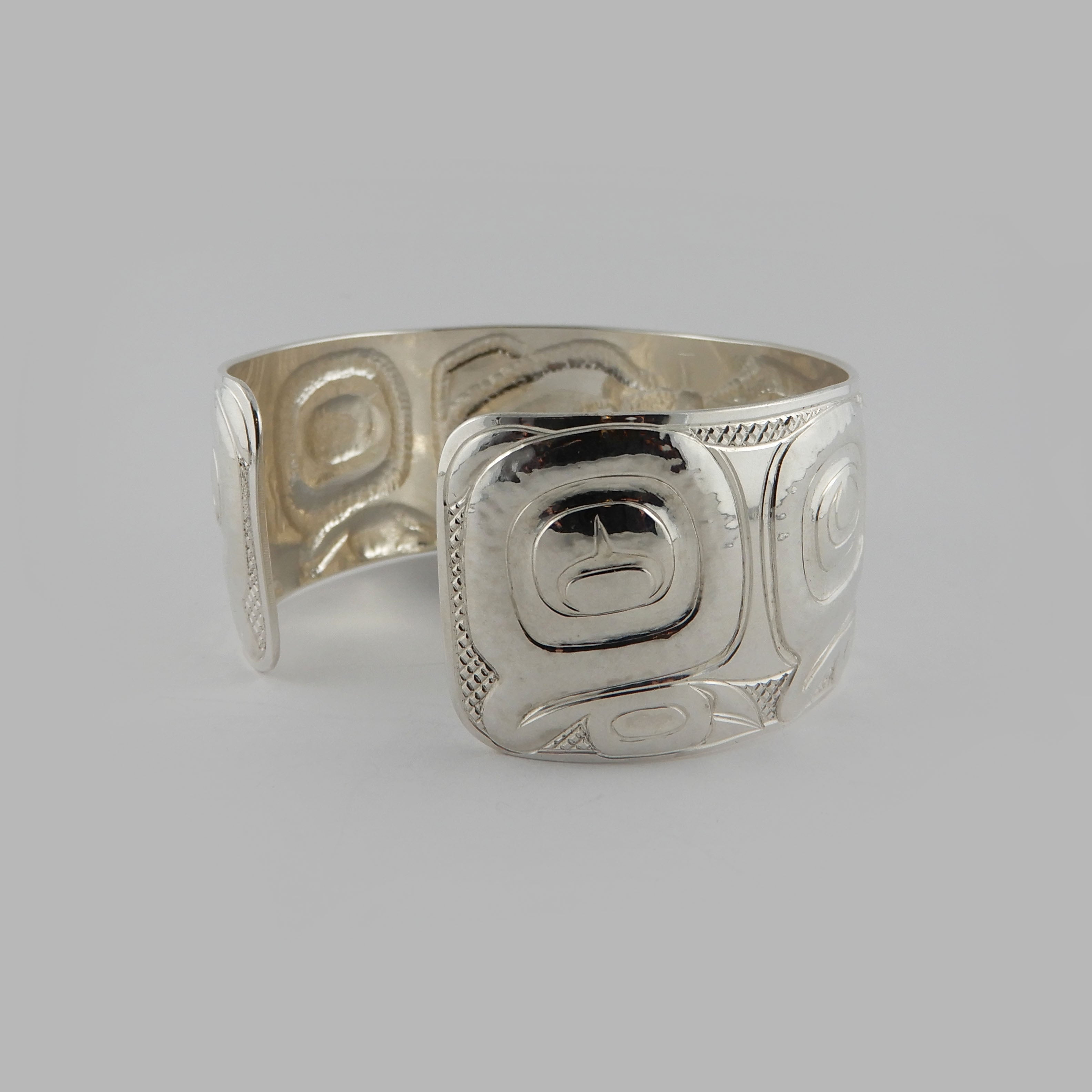 Silver Carved and Hammered Bear Bracelet by Haida artist Derek White