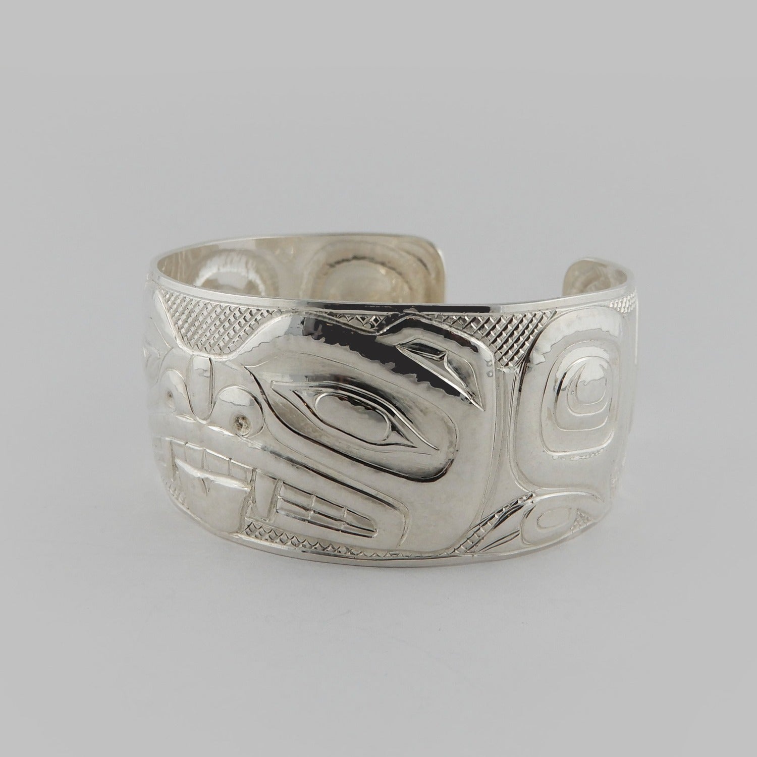 Silver Carved and Hammered Bear Bracelet by Haida artist Derek White