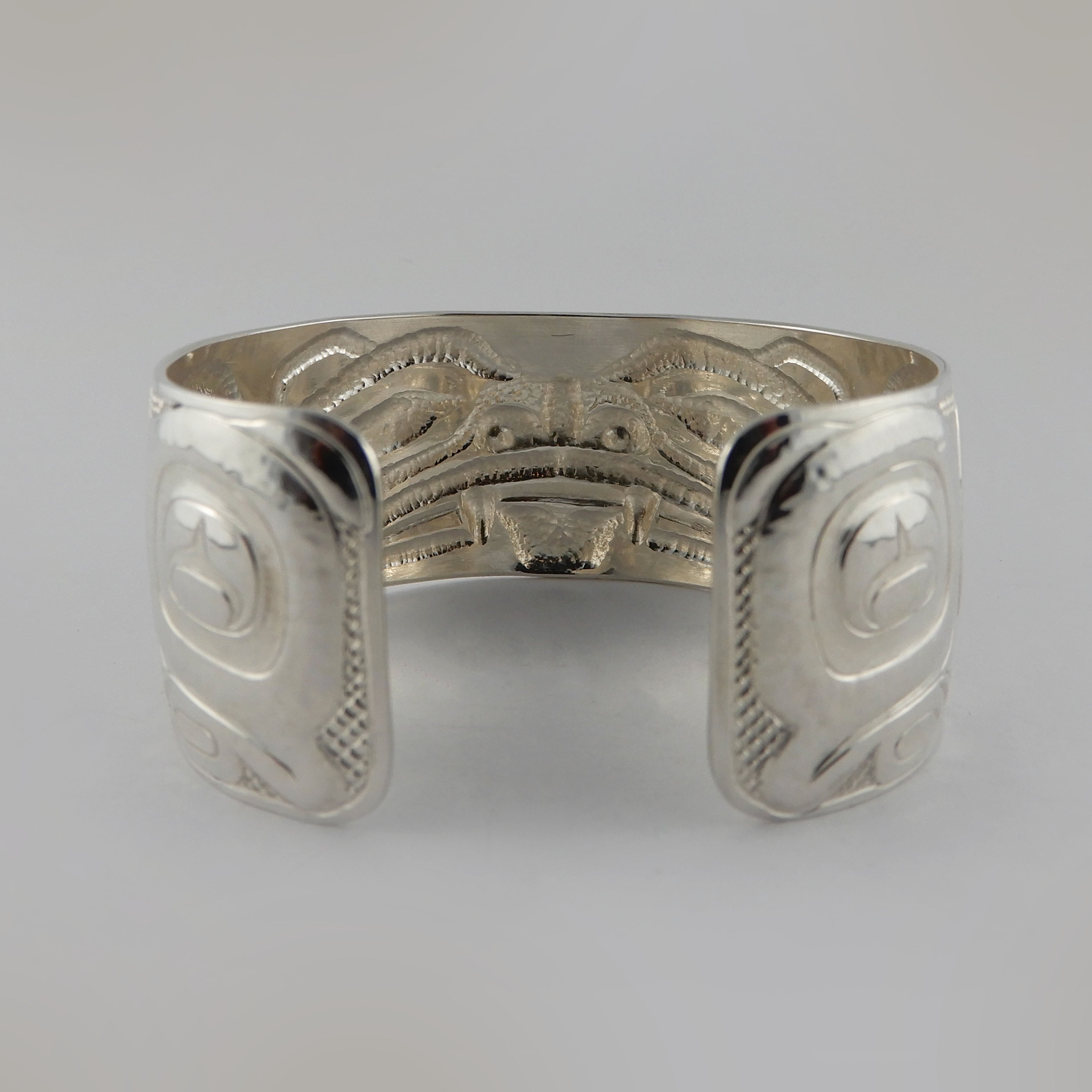 Silver Carved and Hammered Bear Bracelet by Haida artist Derek White