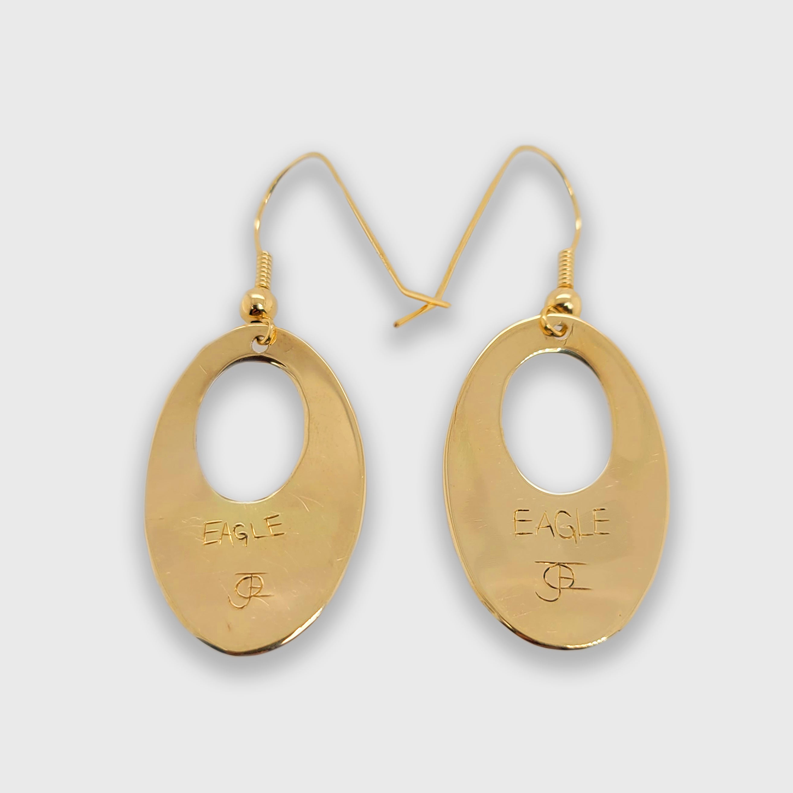 Gold Oval Eagle Earrings by Kwakwaka'wakw artist Joe Wilson