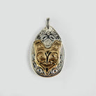 First Nations Silver and Gold Fox Pendant by Kwakwaka'wakw artist Joe Wilson