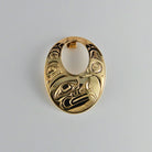 Gold Oval Eagle Pendant by Kwakwaka'wakw artist Joe Wilson