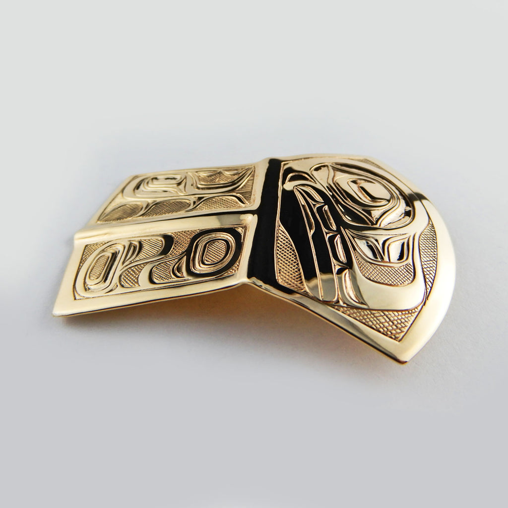 Gold Copper-shaped Orca Pendant by Kwakwaka'wakw artist Joe Wilson