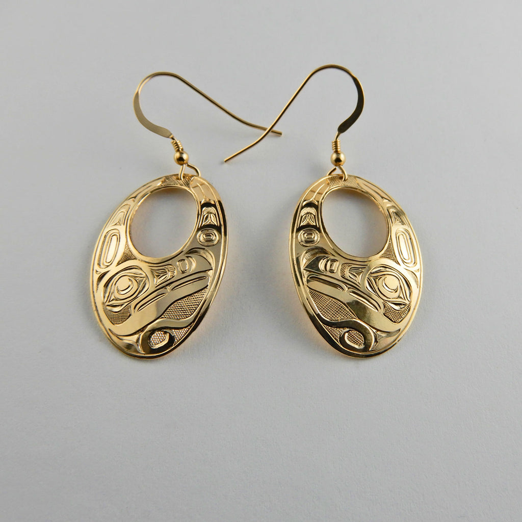 Gold Oval Raven Earrings by Kwakwaka'wakw artist Joe Wilson