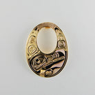 Gold Oval Raven Pendant by Kwakwaka'wakw artist Joe Wilson