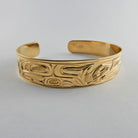 Gold First Nation Wolf Bracelet by Kwakwaka'wakw artist Joe Wilson