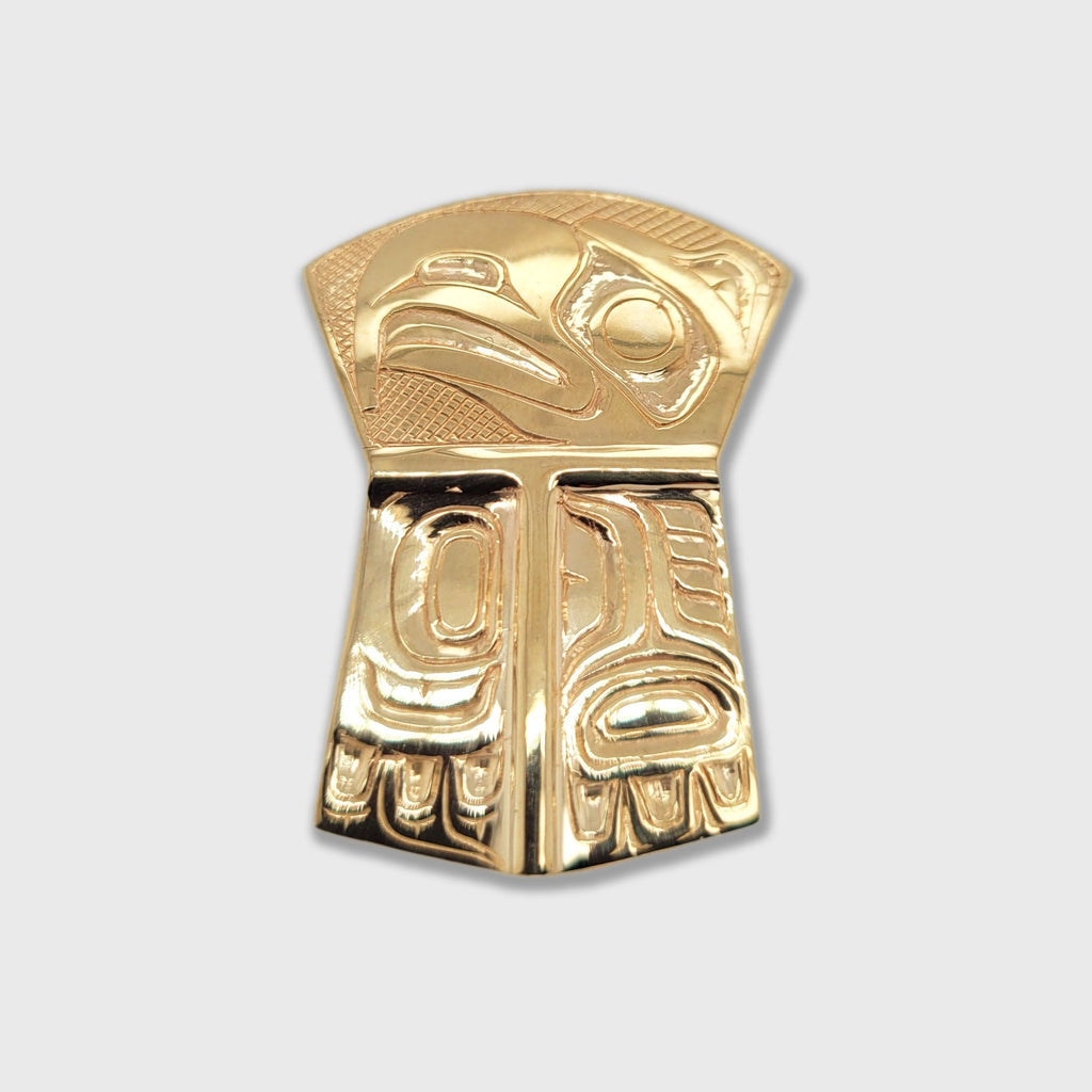 Gold copper-shaped Eagle Pendant by Haida artist Carmen Goertzen