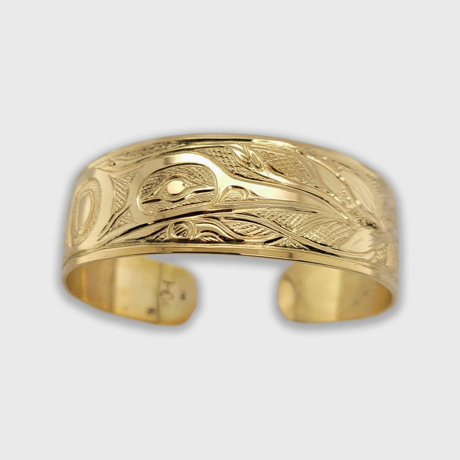 Gold Hummingbird Bracelet by Tsimshian artist Bill Helin