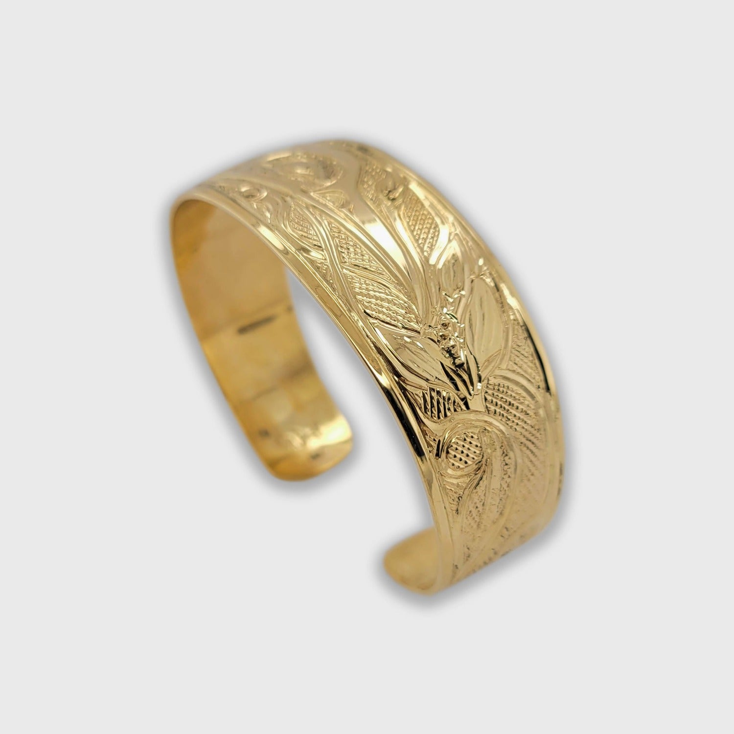 Gold Hummingbird Bracelet by Tsimshian artist Bill Helin