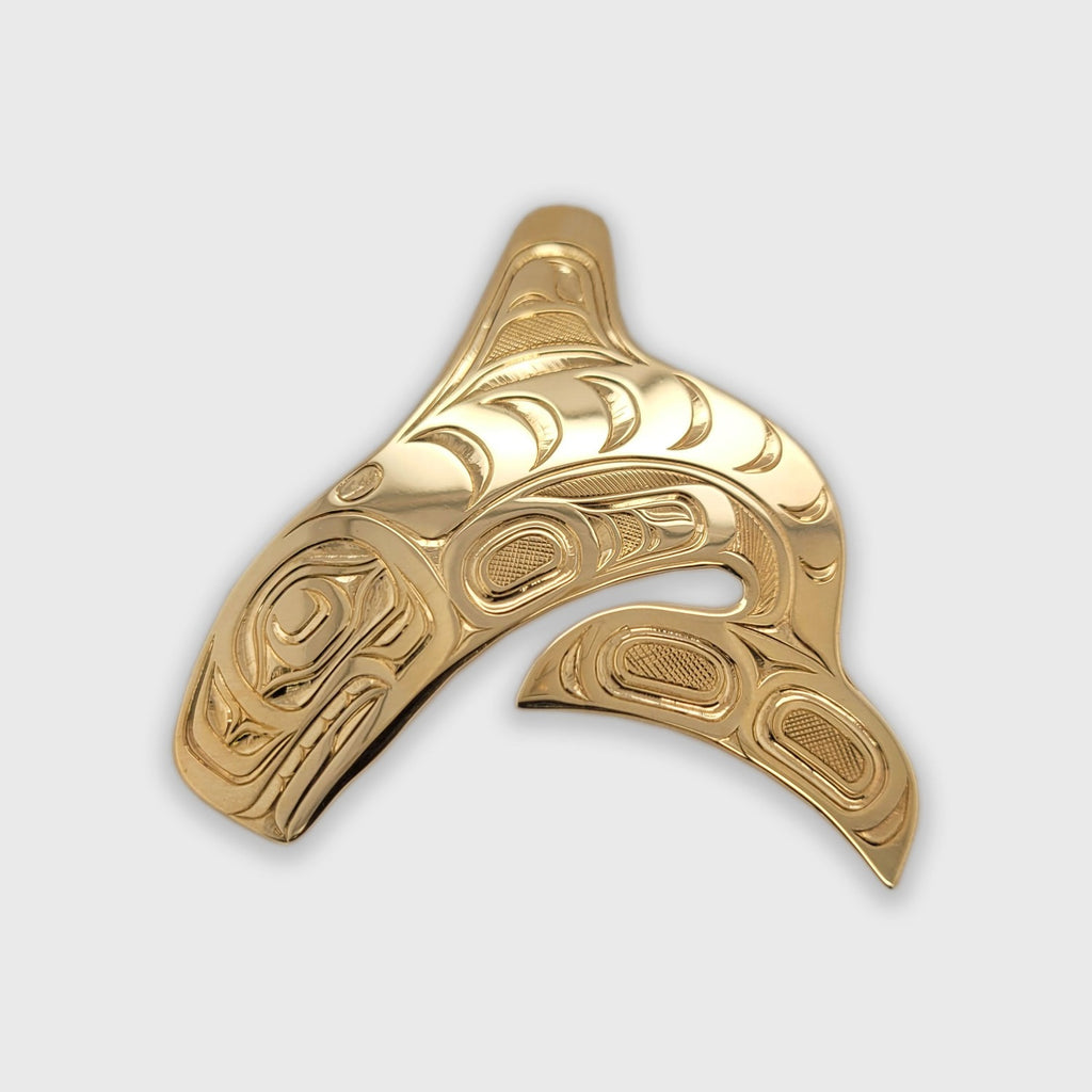 Gold Orca Pendant by Kwakwaka'wakw artist Joe Wilson