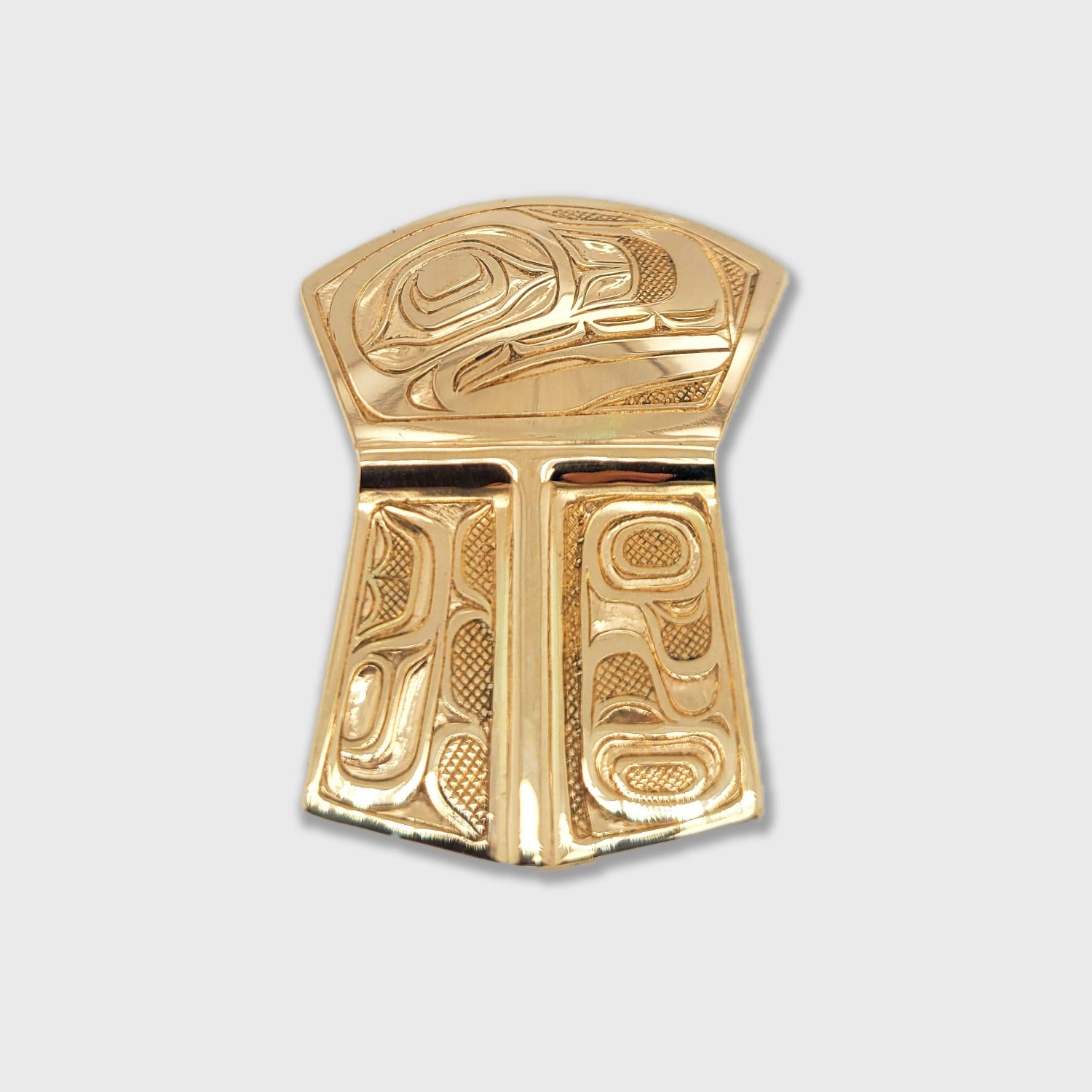 Gold Copper-shaped Orca Pendant by Kwakwaka'wakw artist Joe Wilson