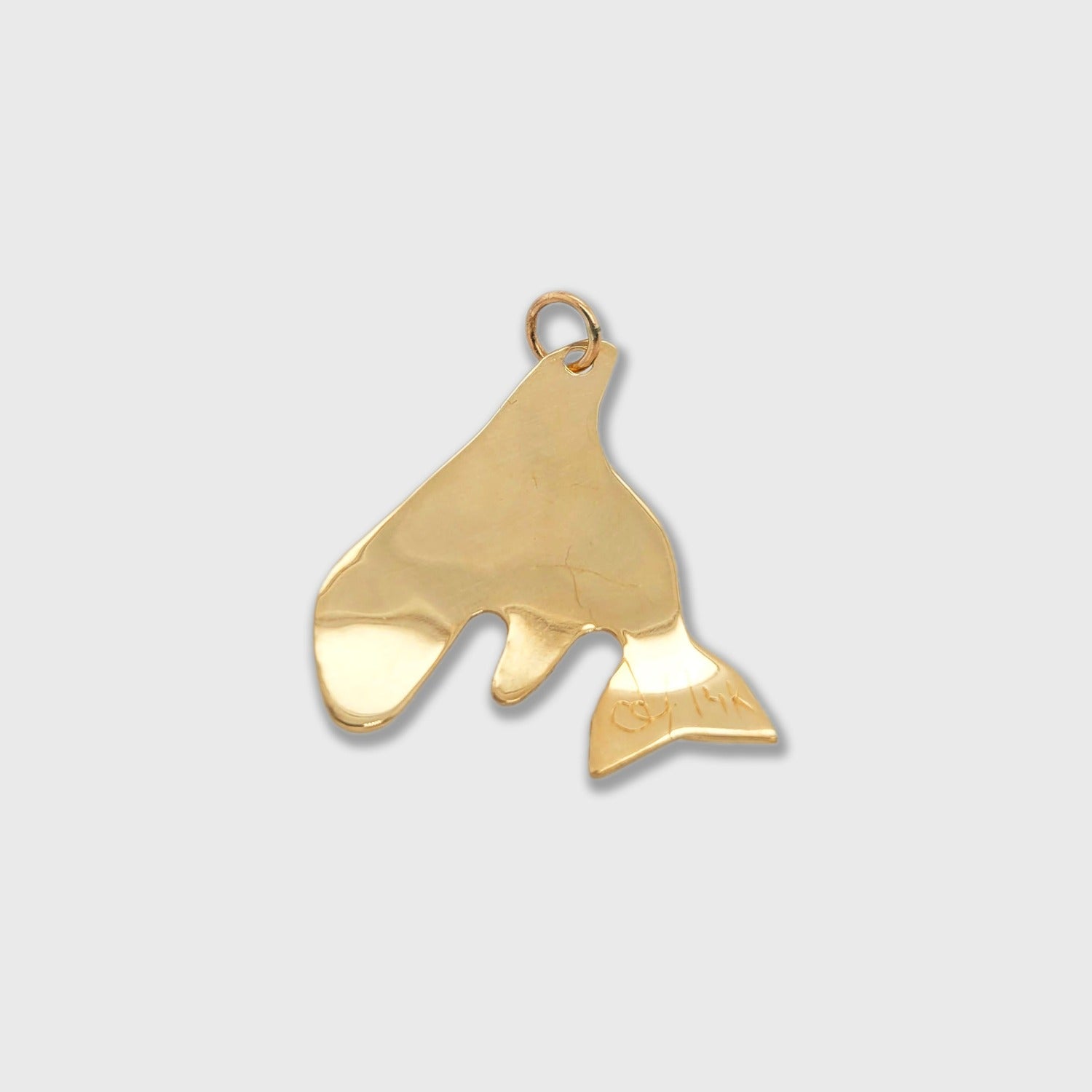 First Nations Gold Orca Pendant by Haida artist Carmen Goertzen