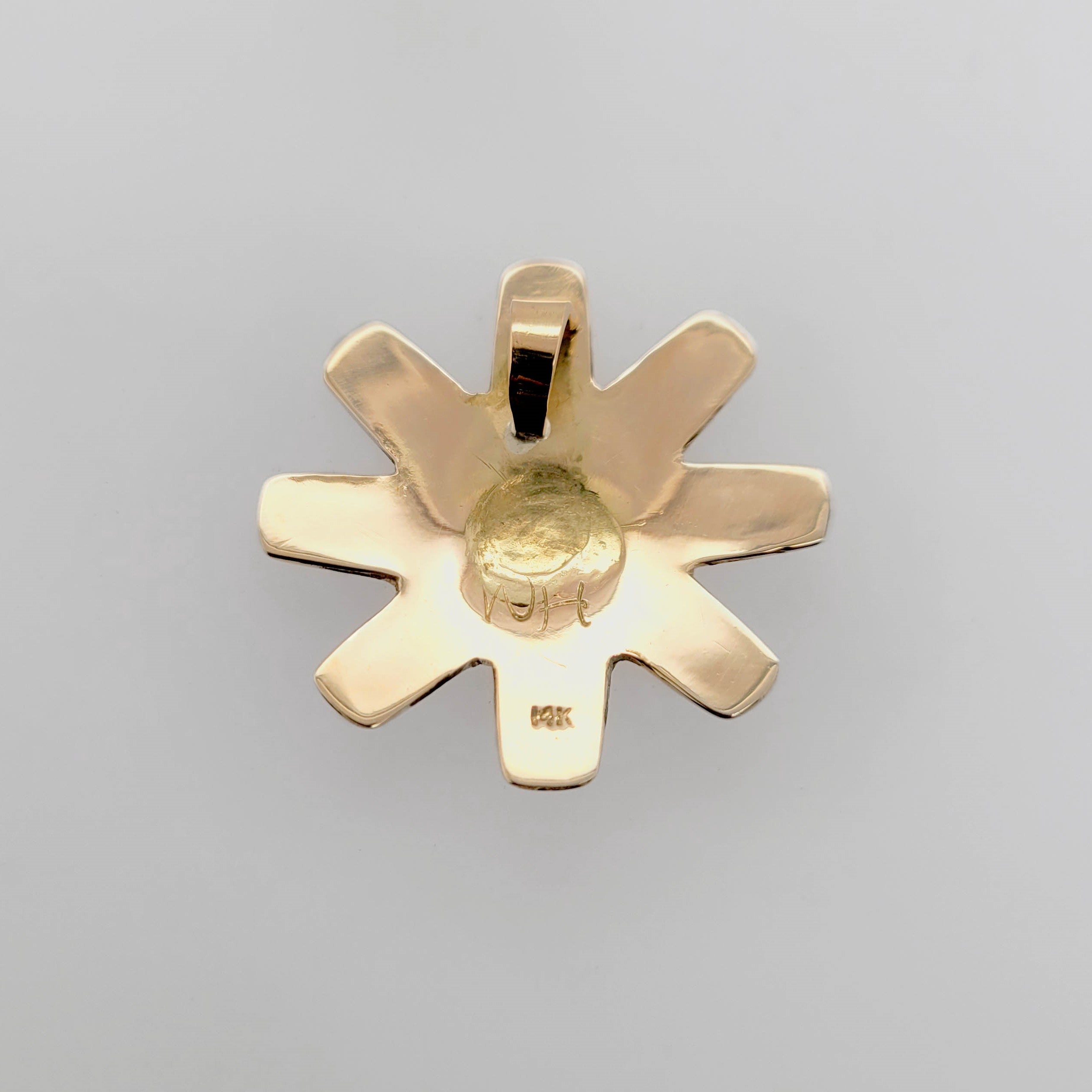 Native Gold Sun Pendant by Tsimshian artist Bill Helin