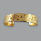 Gold First Nations Wolf Bracelelt by Kwakwaka'wakw artist Joe Wilson