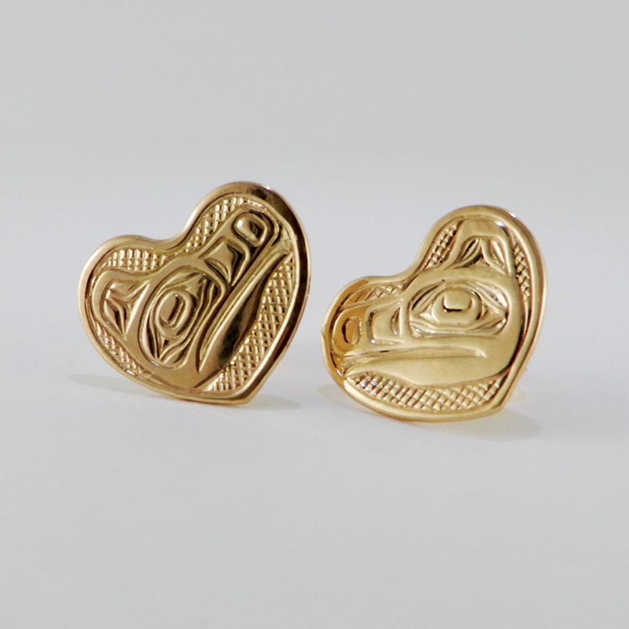 Gold Heart-shaped Wolf stud earrings by Kwakwaka'wakw artist Joe Wilson