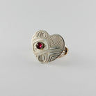 Silver and Garnet Heart-shaped Hummingbird Ring by Kwakwaka'wakw artist Chris Cook