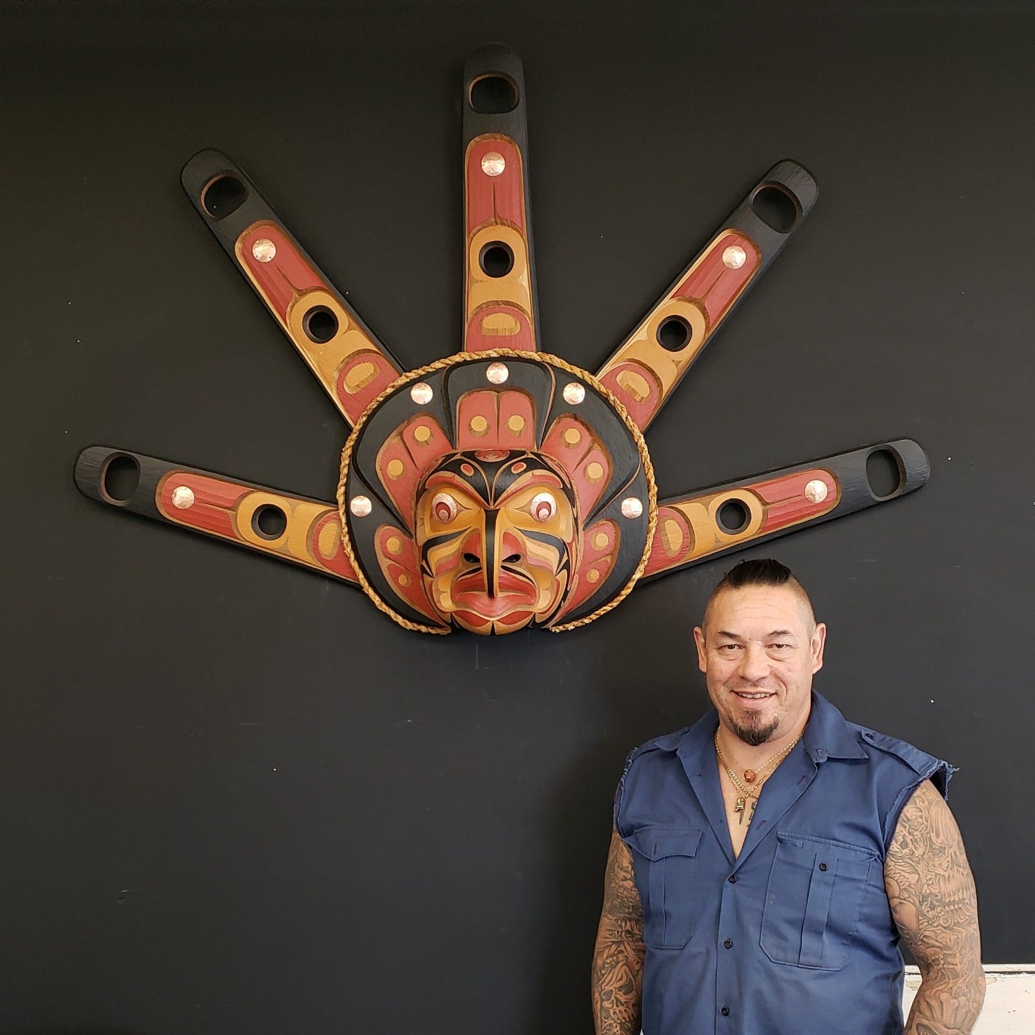 Kwakwaka'wakw artist Junior Henderson with Large Hawk Sun Mask