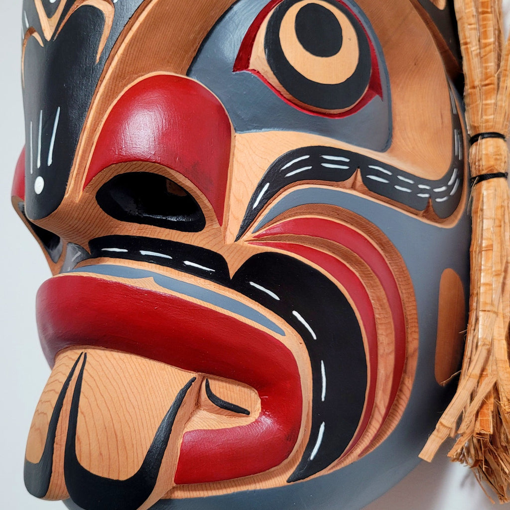 Pugwis and Raven Indigenous Mask hand-carved by Kwakwaka'wakw artist Bill Henderson