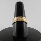 Gold Raven Ring by Haida artist Carmen Goertzen