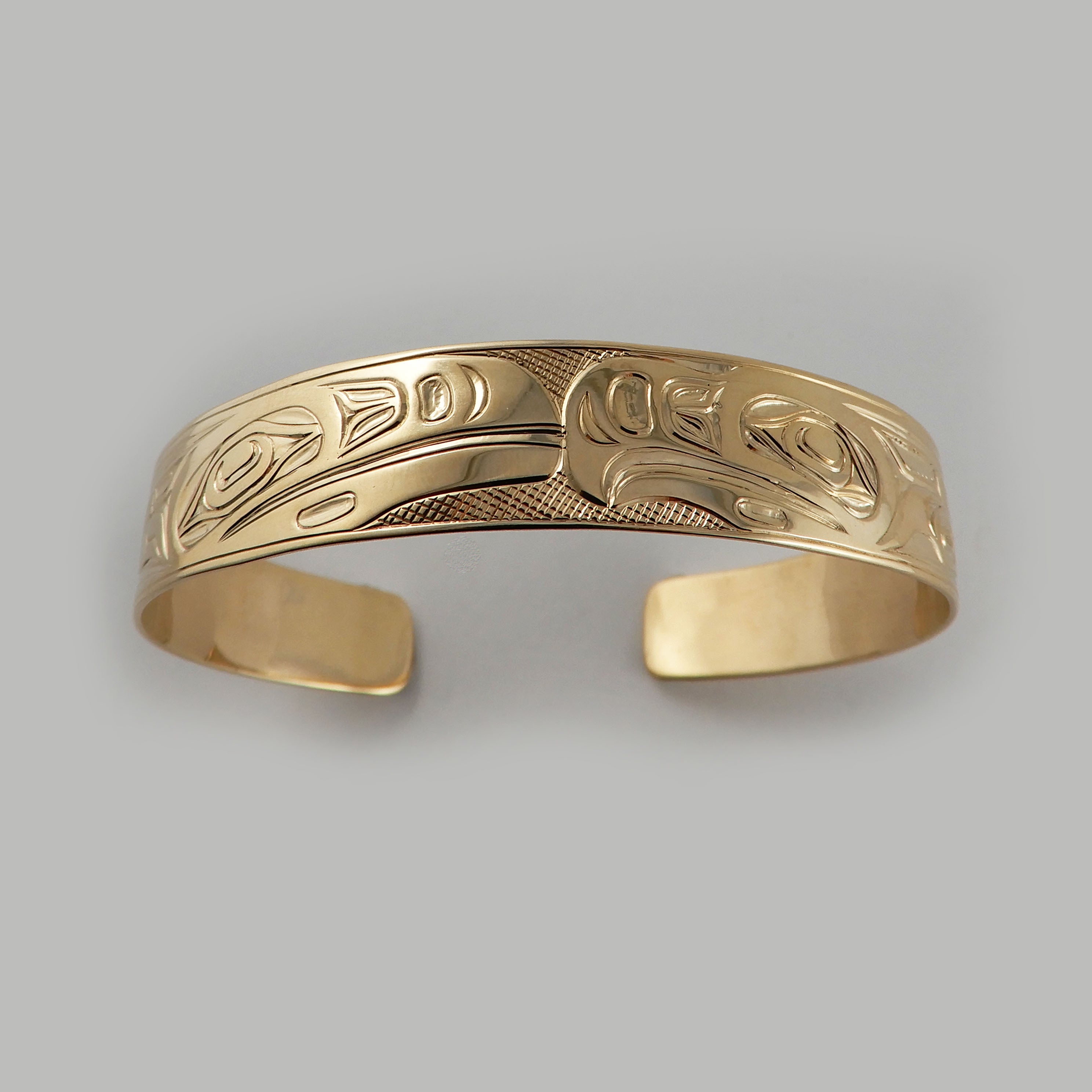 First Nations Gold Love Birds Bracelet by Kwakwaka'wakw artist Joe Wilson