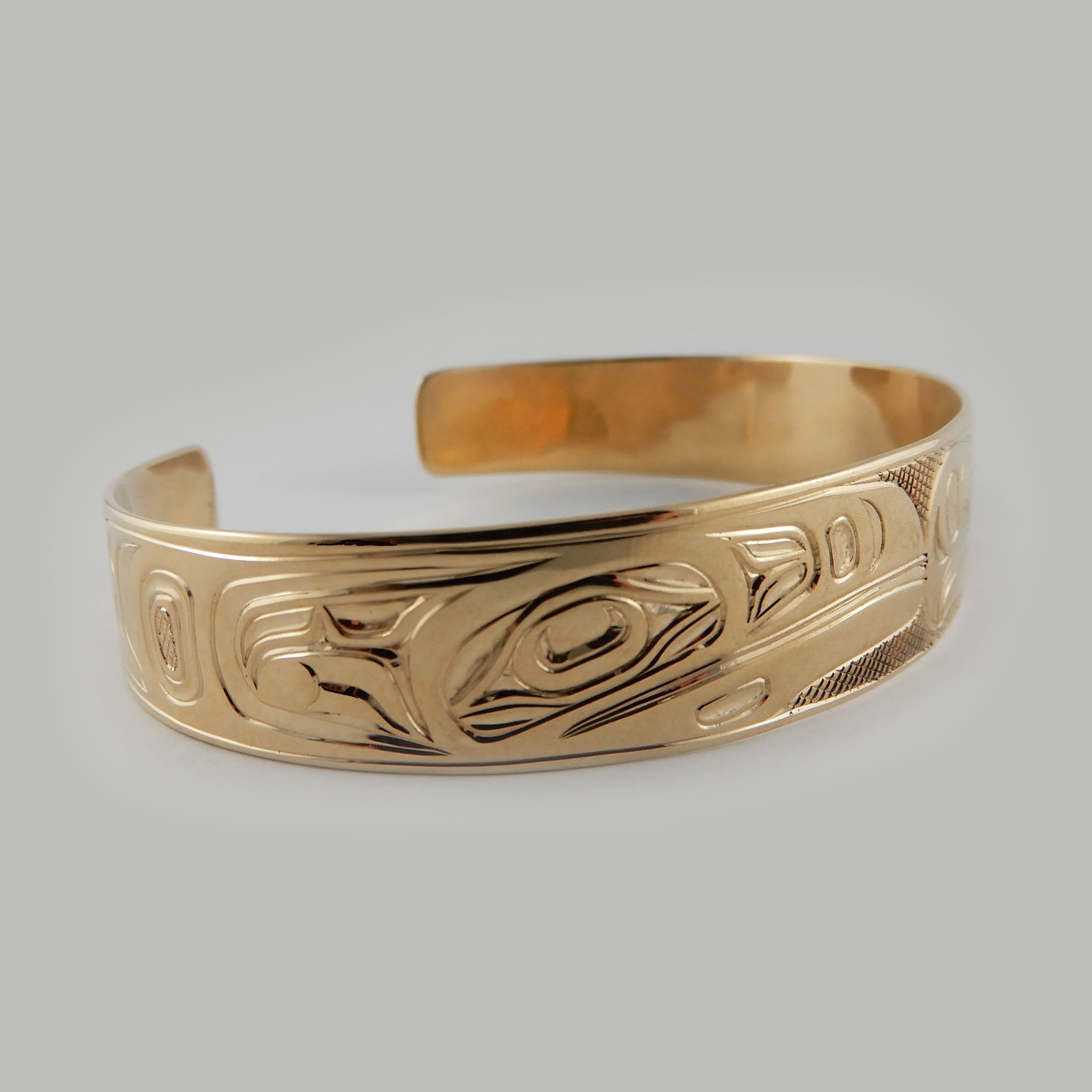 First Nations Gold Love Birds Bracelet by Kwakwaka'wakw artist Joe Wilson