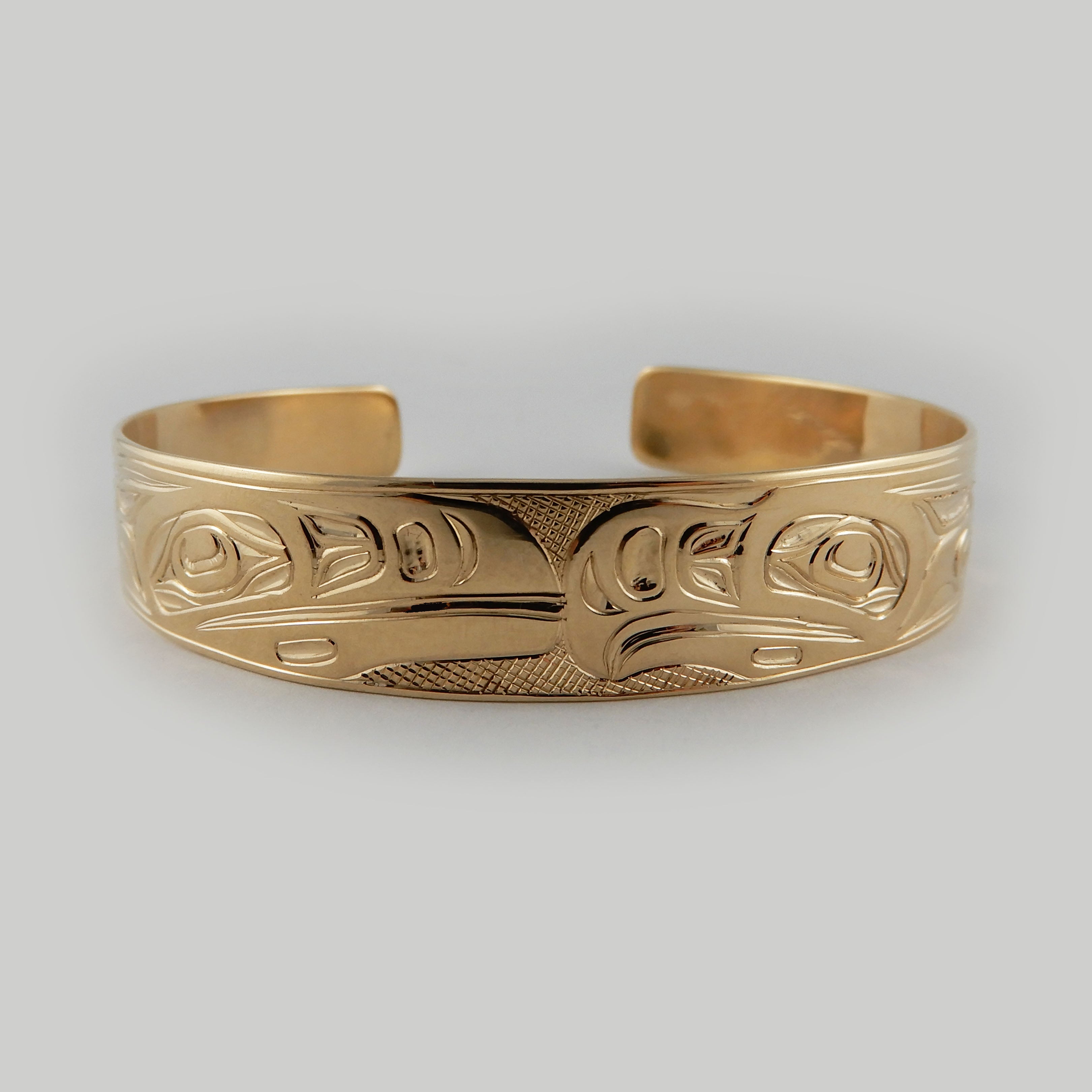 First Nations Gold Love Birds Bracelet by Kwakwaka'wakw artist Joe Wilson