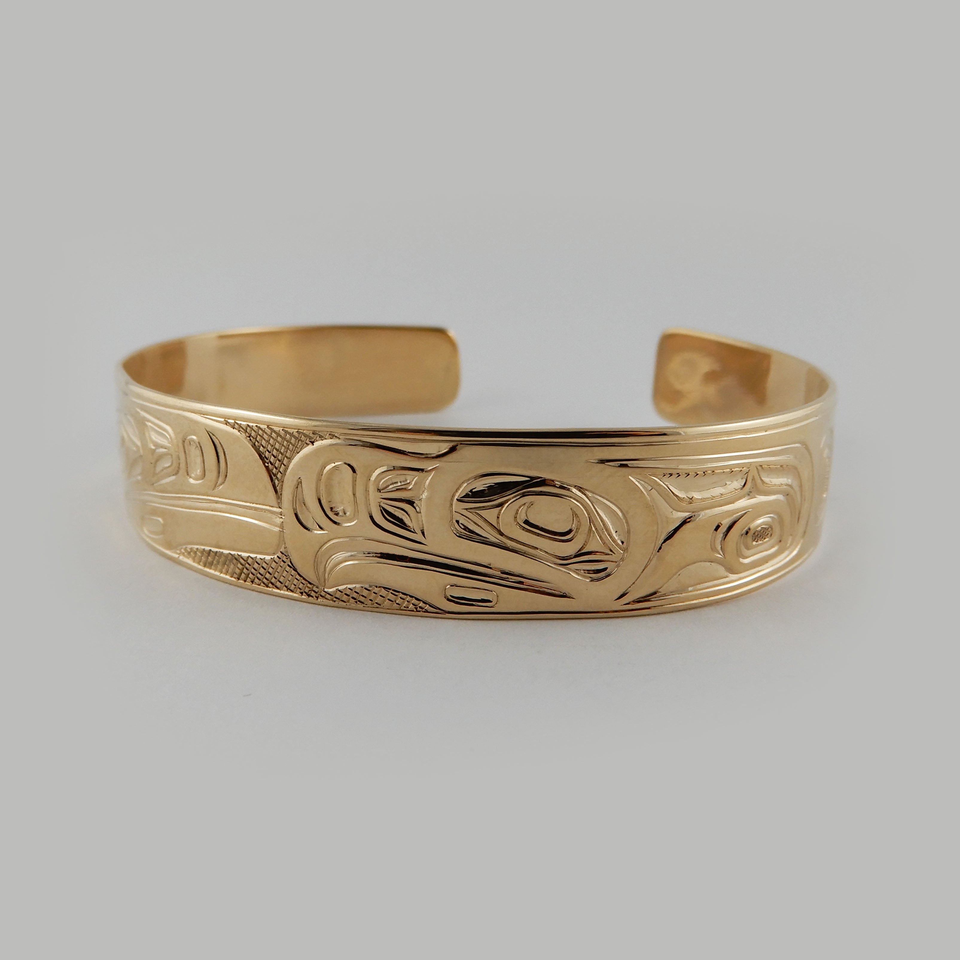 First Nations Gold Love Birds Bracelet by Kwakwaka'wakw artist Joe Wilson